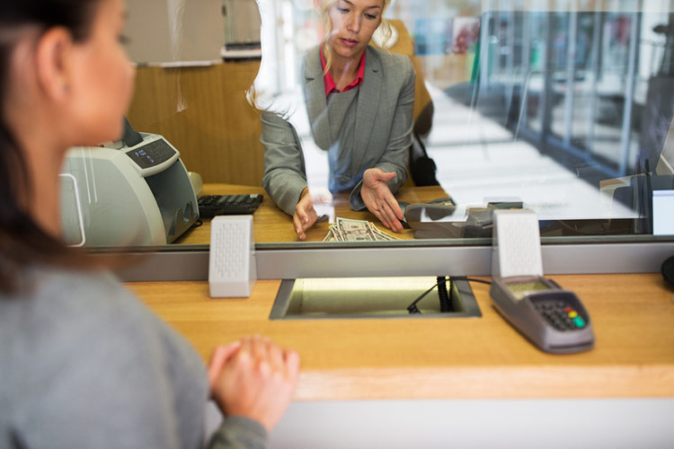 bank teller with customer